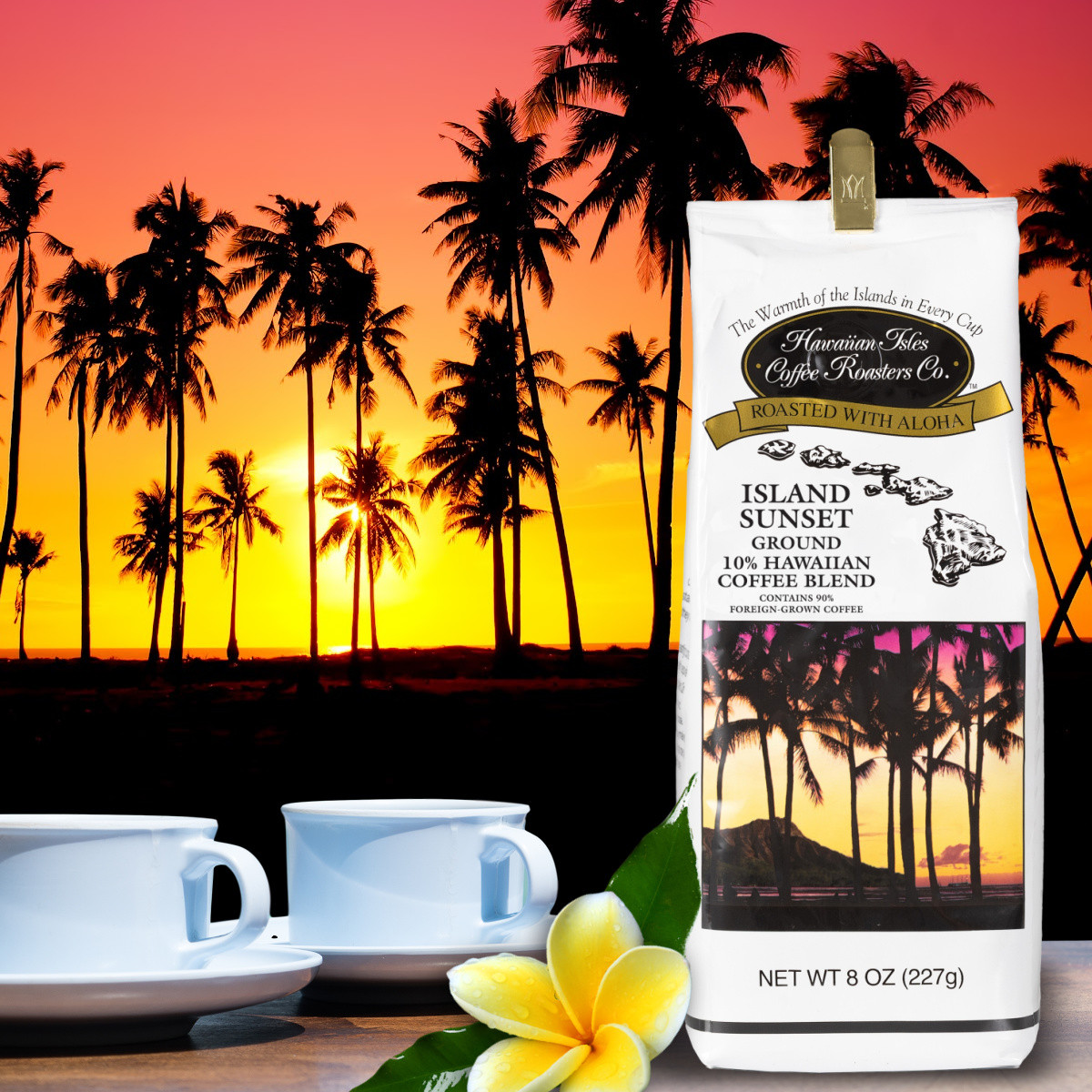 Bag of Island Sunset coffee on a table with sunset and palm tree background